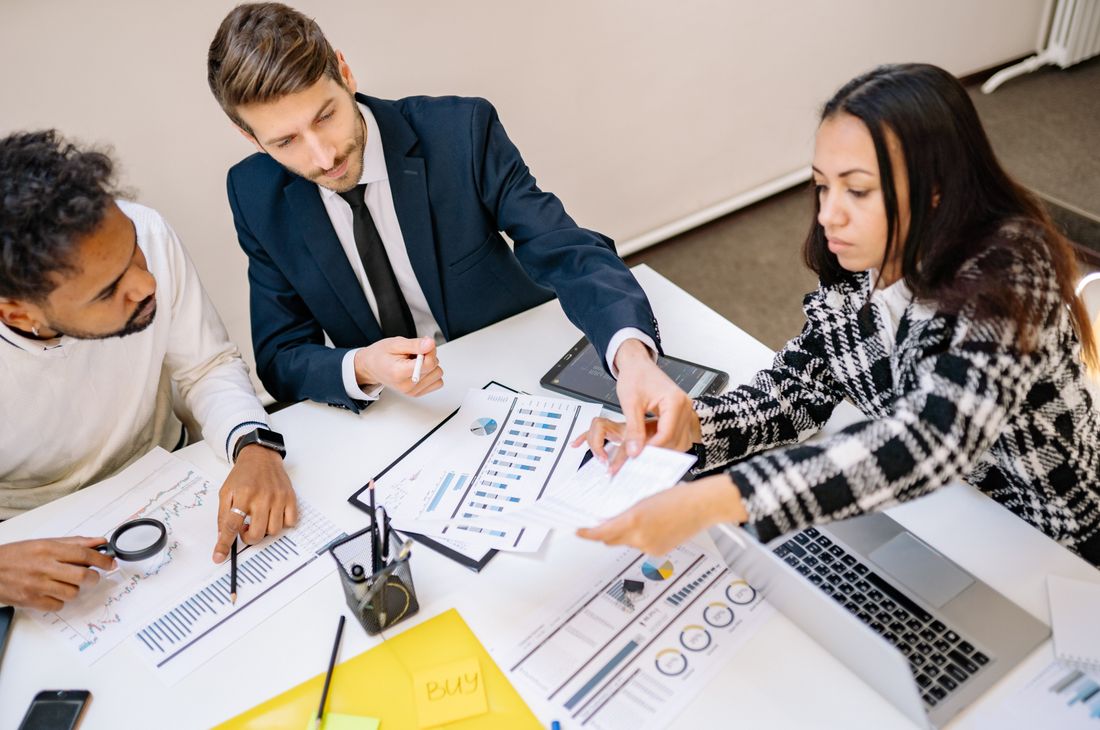 A small-business team working together in a bright office