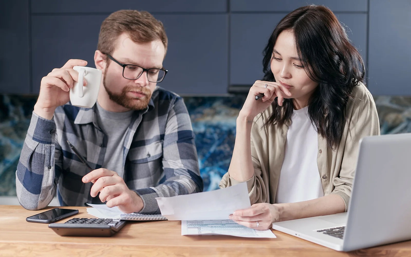 A couple reviewing coverage documents together
